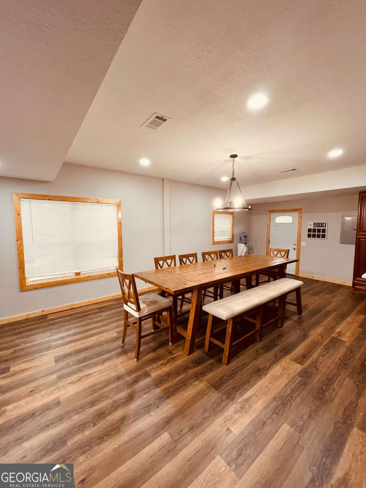 147 McLoon Road Hazlehurst, GA 31539 - Photo 7 of 38 a large room with furniture a rug and a window