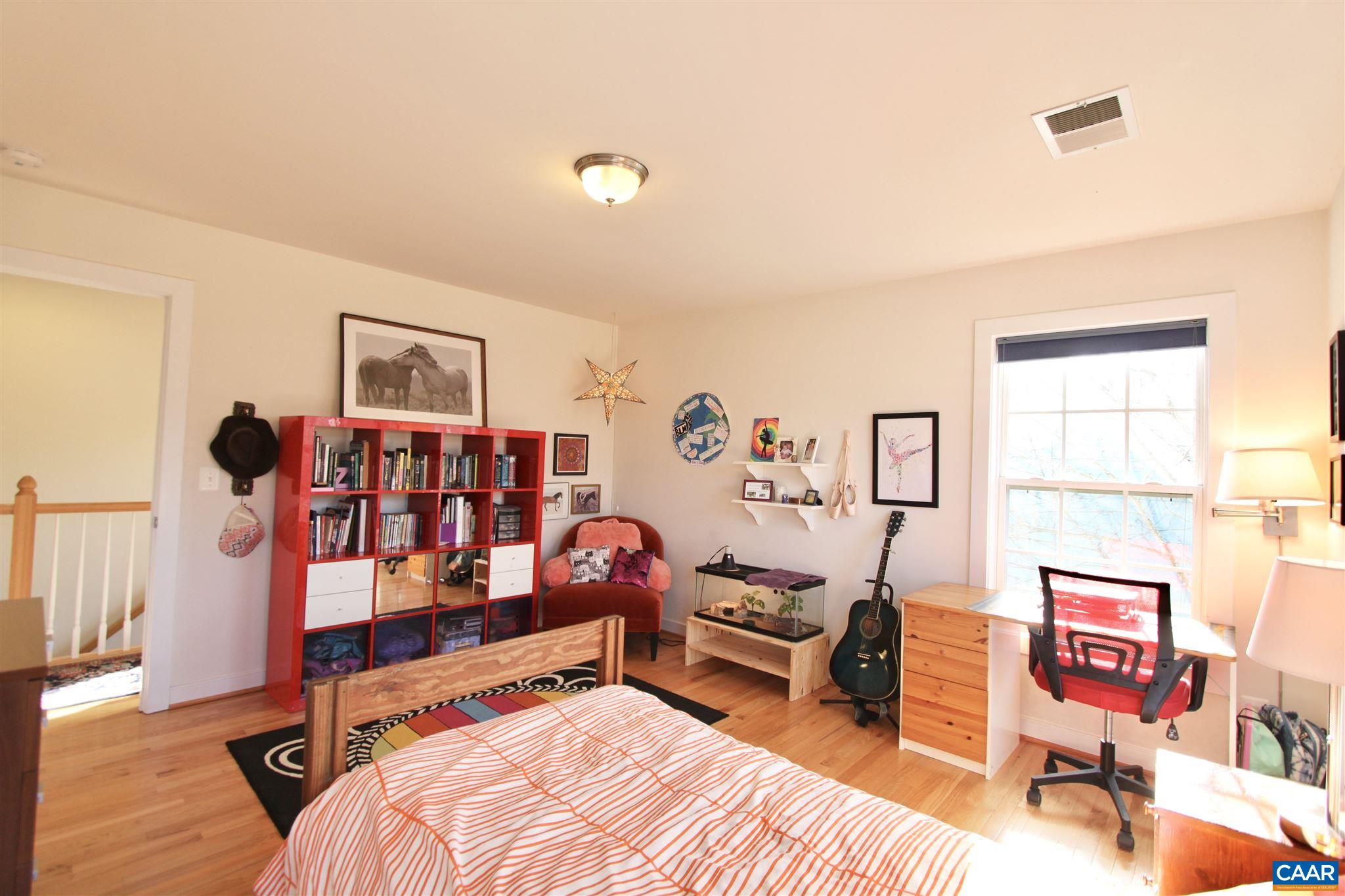5441 Park Road Crozet, VA 22932 - Photo 21 of 30 a bedroom with furniture and a wooden floor