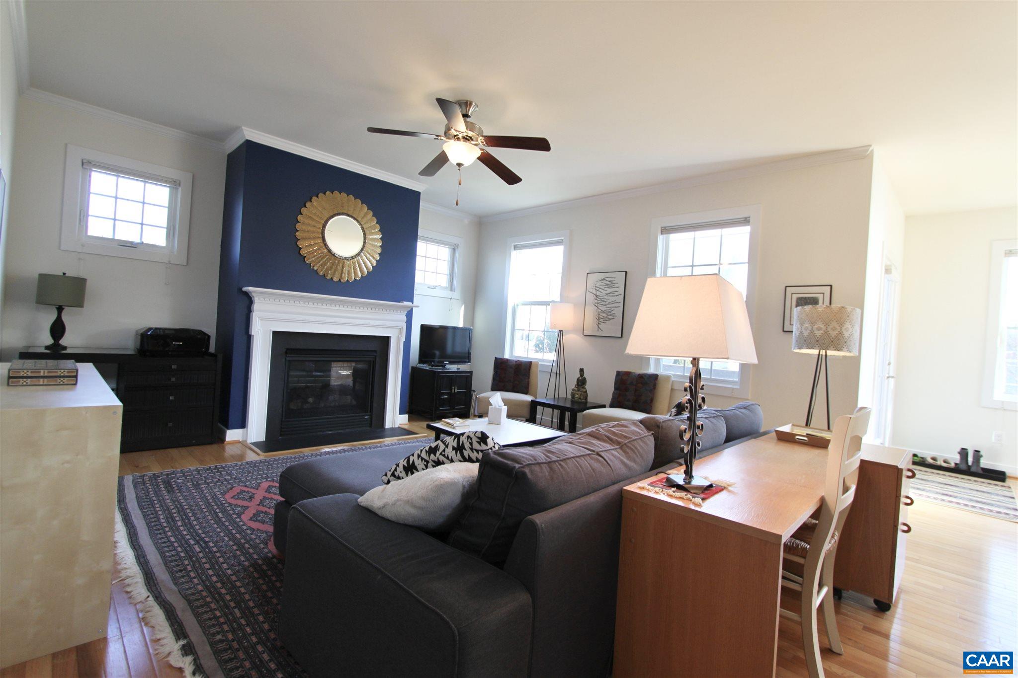 5441 Park Road Crozet, VA 22932 - Photo 6 of 30 a living room with furniture a fireplace and a window