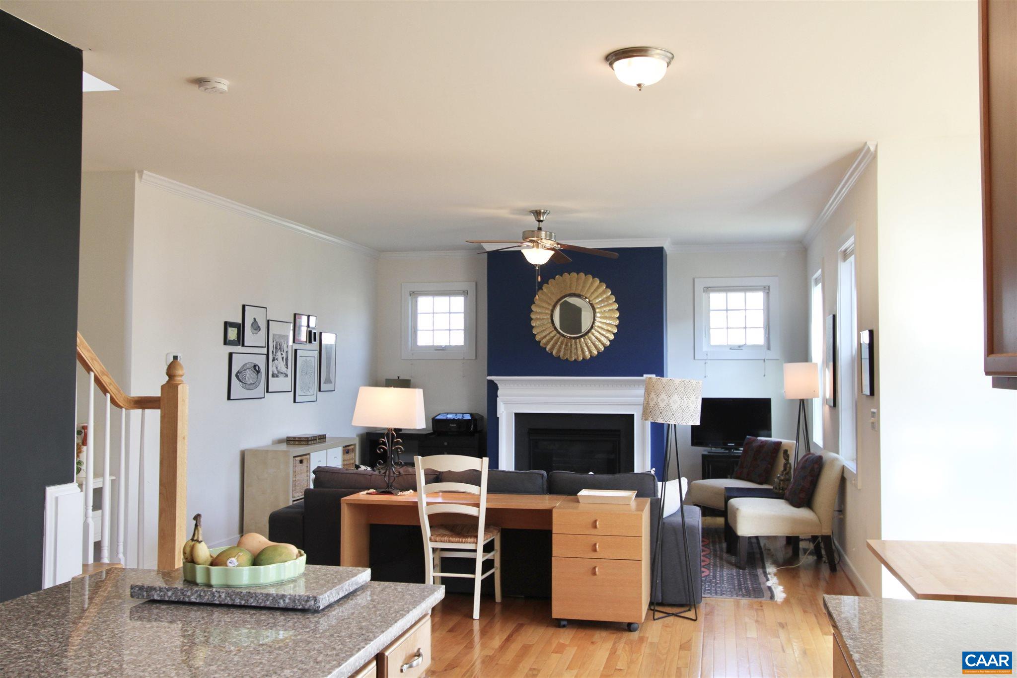 5441 Park Road Crozet, VA 22932 - Photo 8 of 30 a living room with furniture a fireplace and a table