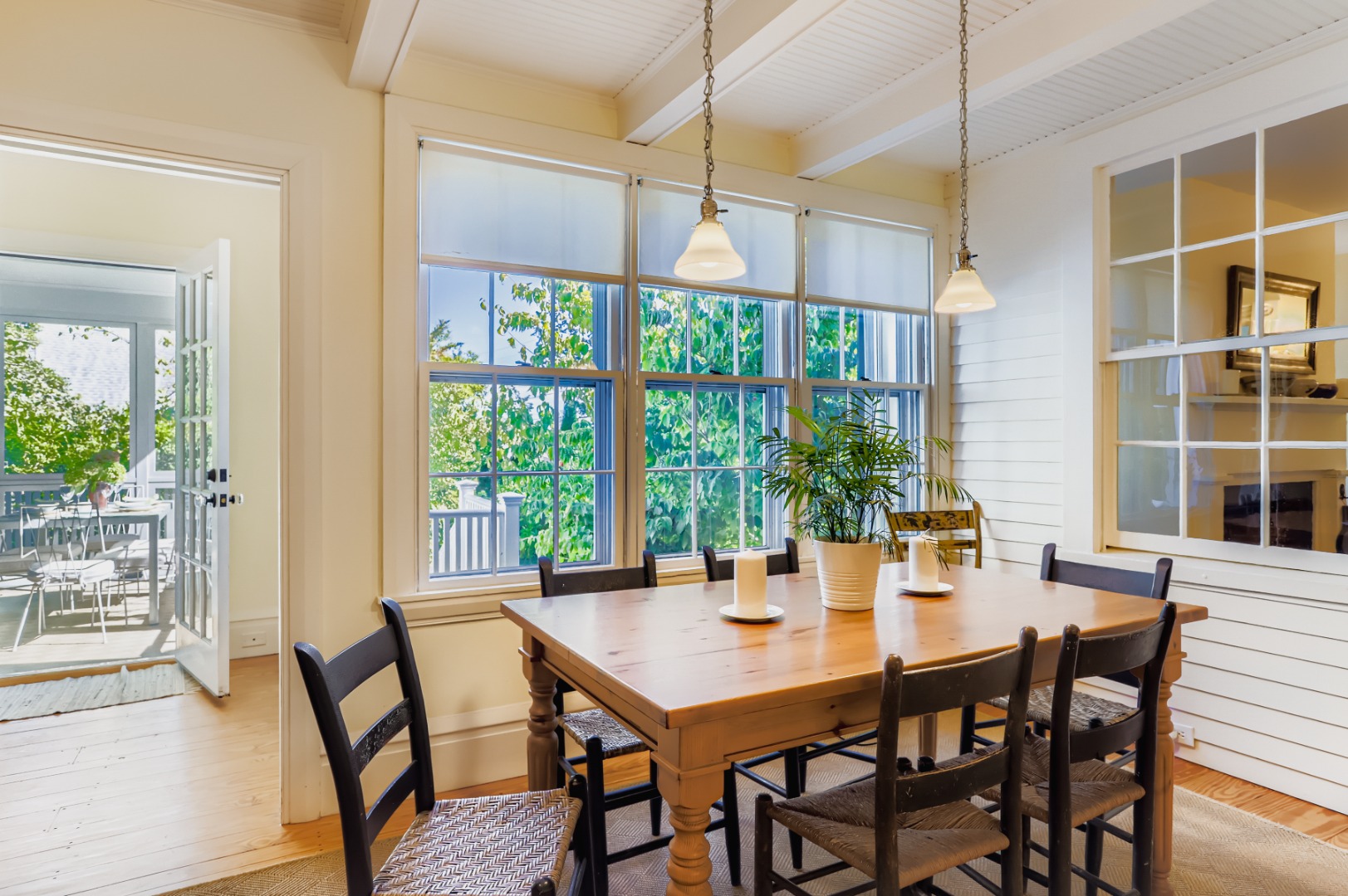 27 Spring Street Vineyard Haven, MA 02568 - Photo 11 of 59 a view of a dining room with furniture and window