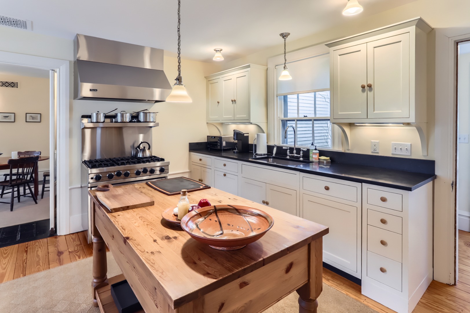 27 Spring Street Vineyard Haven, MA 02568 - Photo 13 of 59 a kitchen with stainless steel appliances a stove a sink and a refrigerator