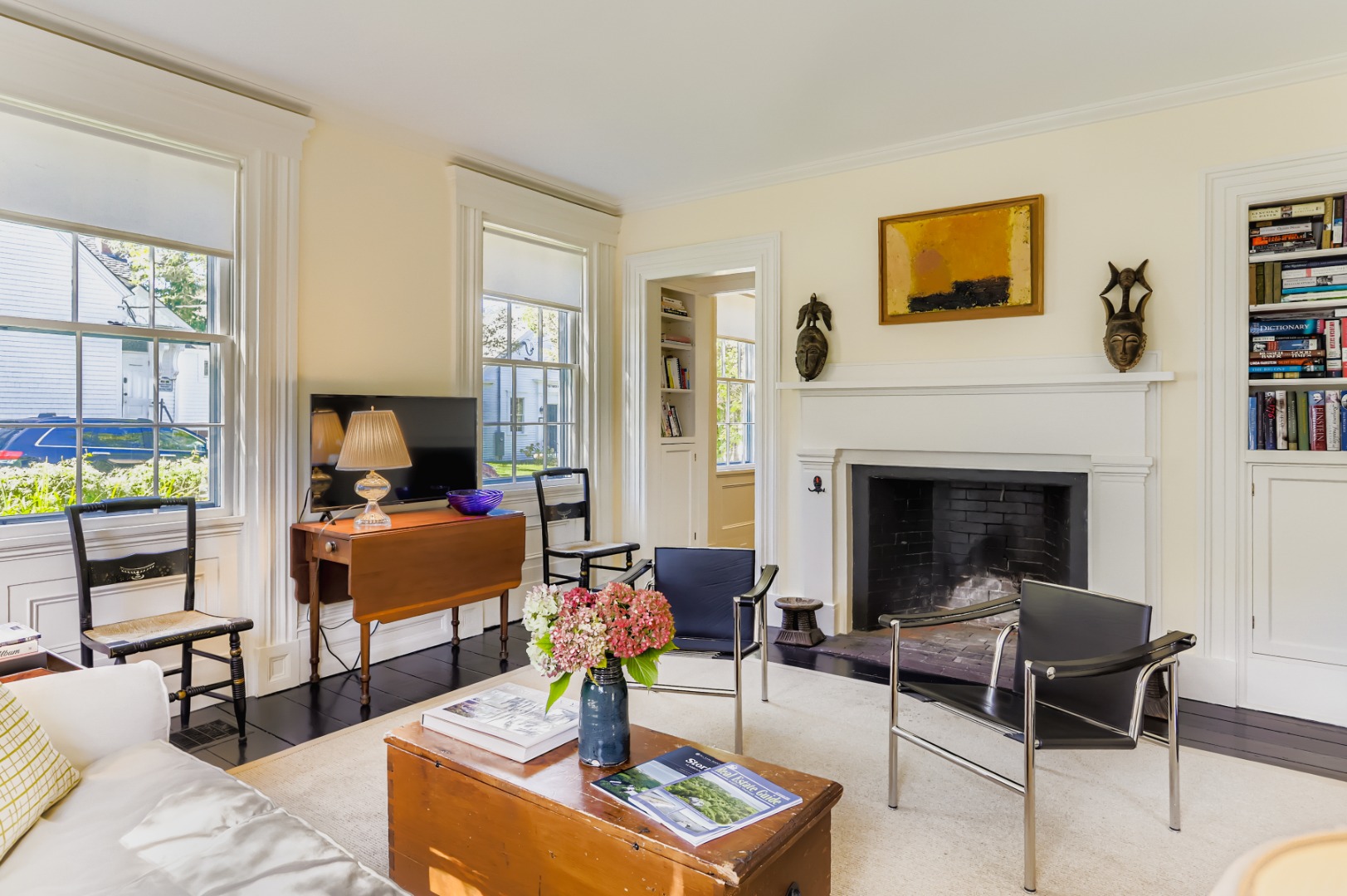 27 Spring Street Vineyard Haven, MA 02568 - Photo 22 of 59 a living room with furniture and a fireplace