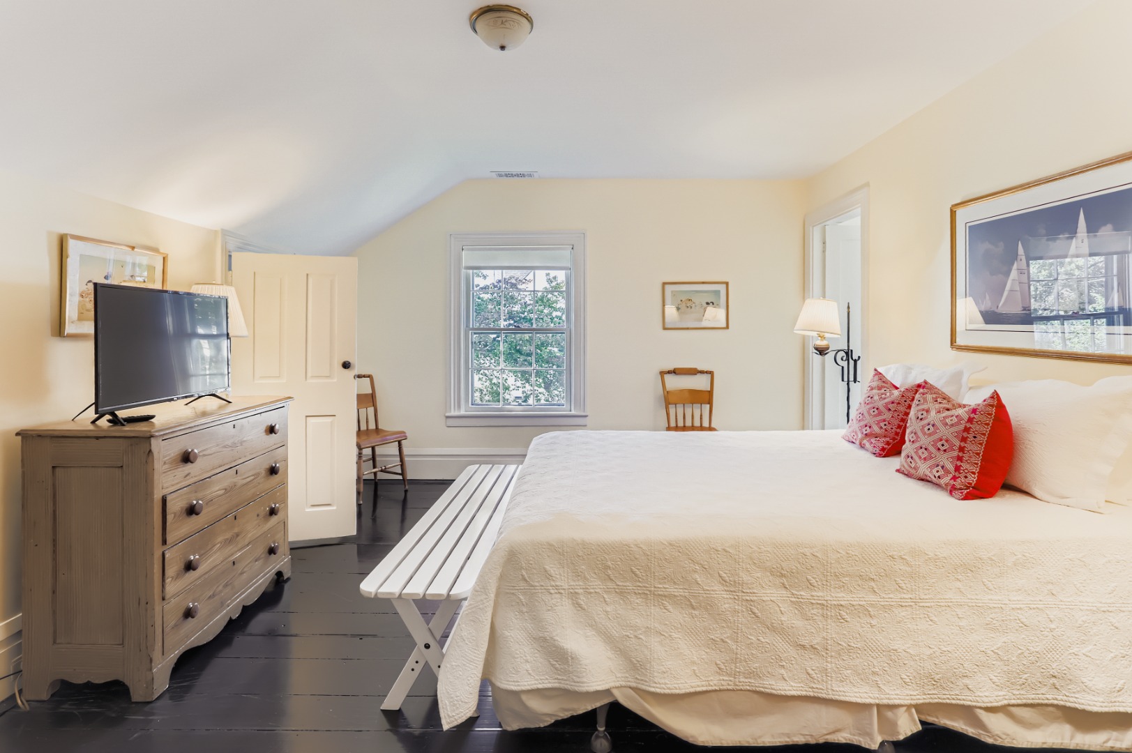 27 Spring Street Vineyard Haven, MA 02568 - Photo 46 of 59 a bedroom with a bed and a flat screen tv