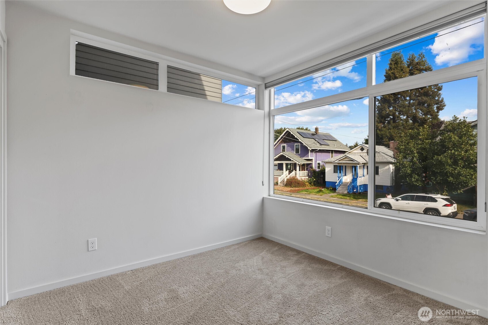 6917 Carleton Avenue South, Unit B Seattle, WA 98108 - Photo 13 of 25 a room with window