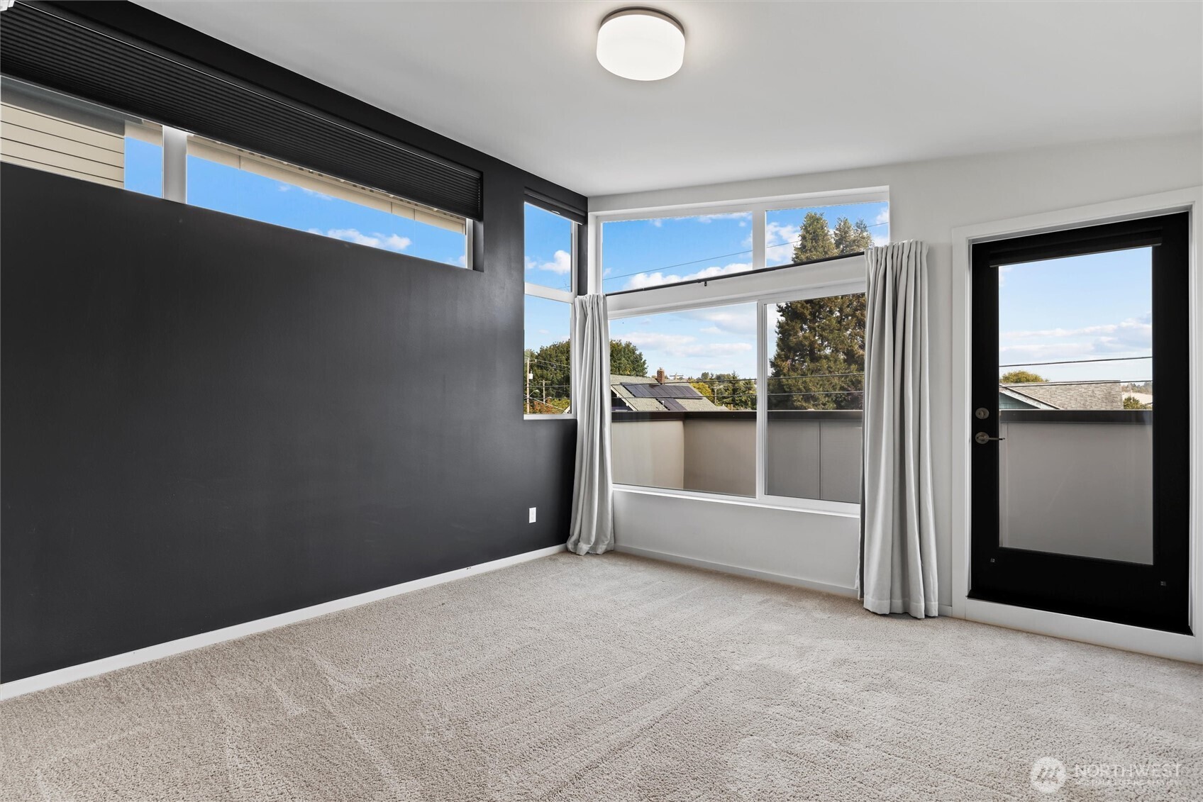 6917 Carleton Avenue South, Unit B Seattle, WA 98108 - Photo 15 of 25 a view of an empty room with a window
