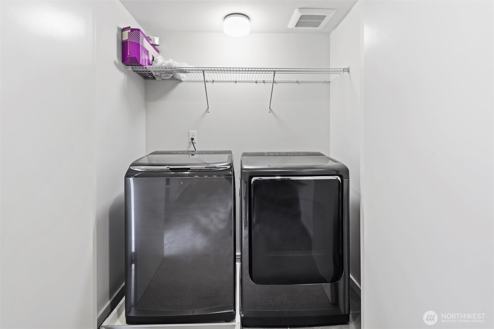 6917 Carleton Avenue South, Unit B Seattle, WA 98108 - Photo 20 of 25 a utility room with dryer and washer