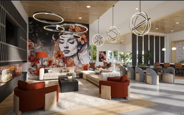 a living room with patio furniture and a chandelier