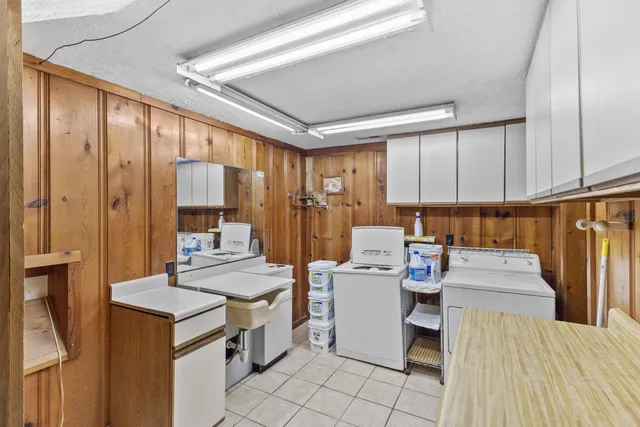 a balcony with furniture and wooden floor