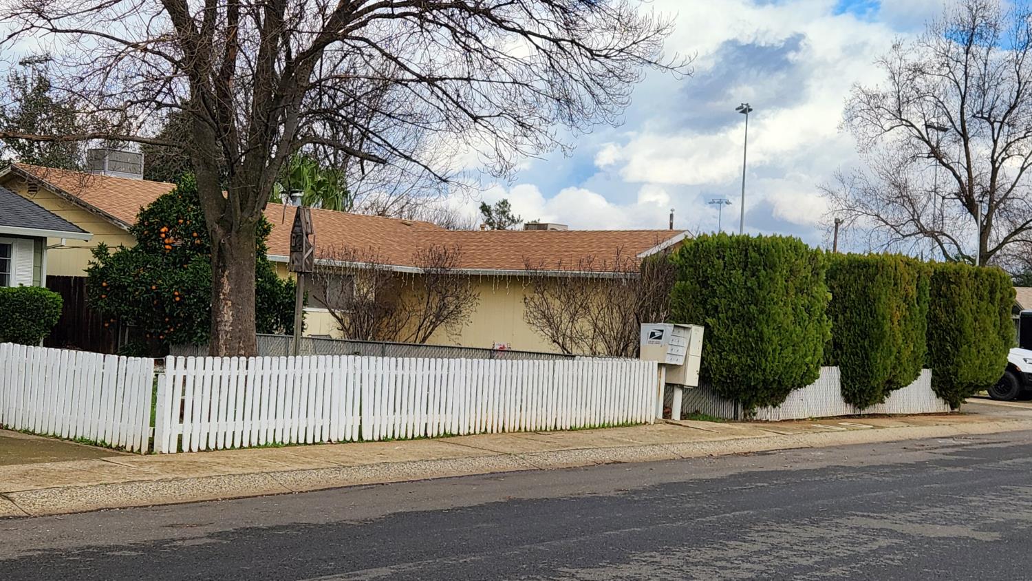a view of a house with a street