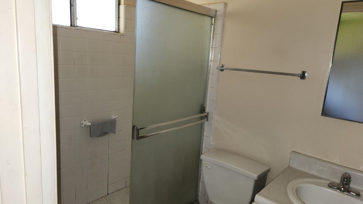 2332 Venus Way Redding, CA 96002 - Photo 16 of 27 a bathroom with a sink and toilet