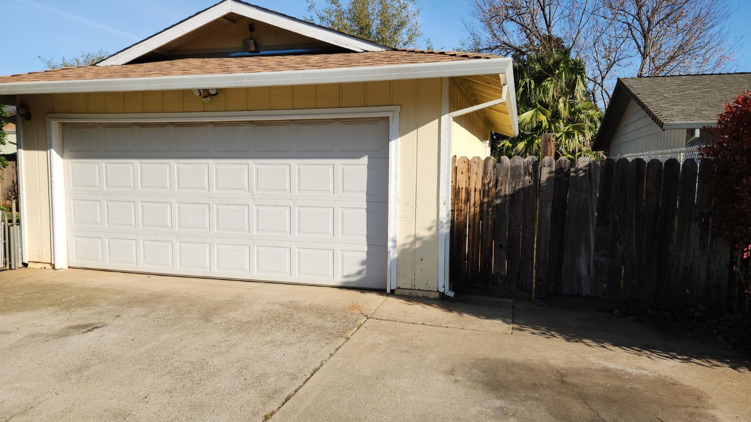 2332 Venus Way Redding, CA 96002 - Photo 27 of 27 a front view of a house with a yard and garage