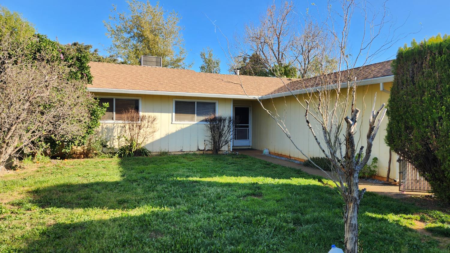 2332 Venus Way Redding, CA 96002 - Photo 5 of 27 a view of a house with a yard