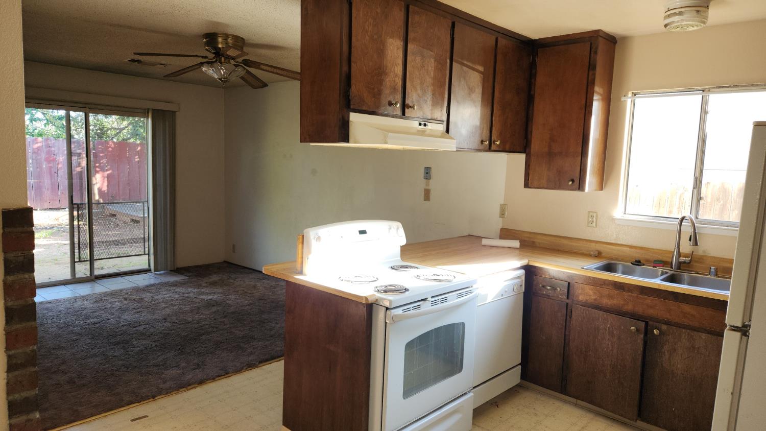 2332 Venus Way Redding, CA 96002 - Photo 10 of 27 a kitchen with a stove microwave and sink