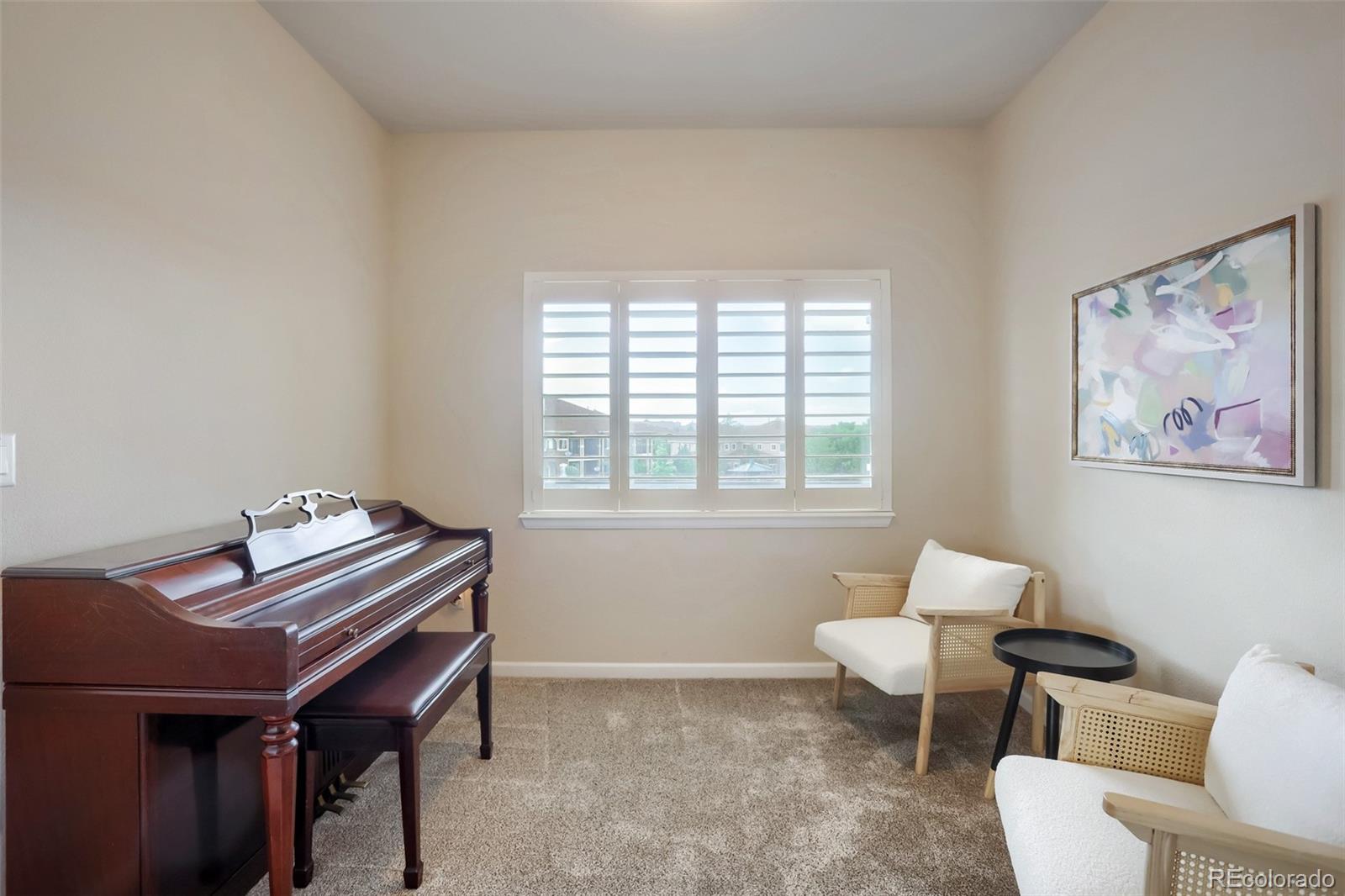6232 Kilmer Loop, Unit 203 Golden, CO 80403 - Photo 19 of 33 a living room with furniture and a window