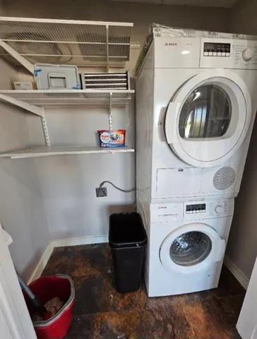 a kitchen with a wooden floor and window