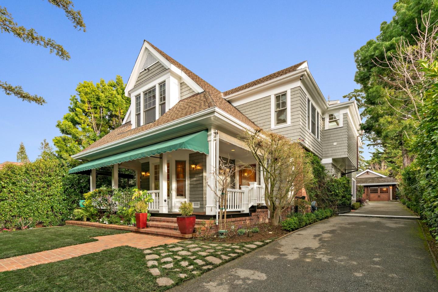 front view of a house with a yard