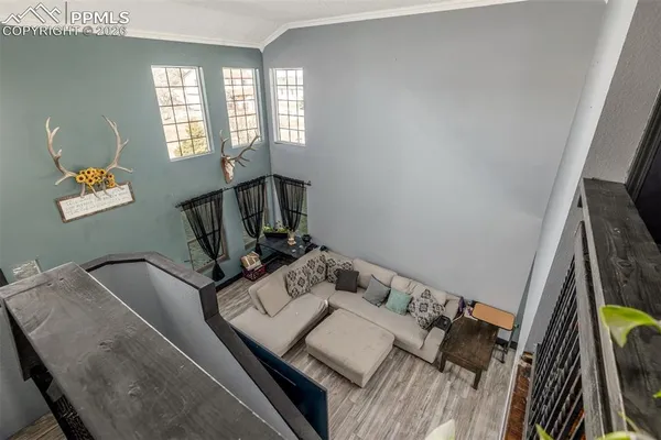 a view of a balcony with furniture