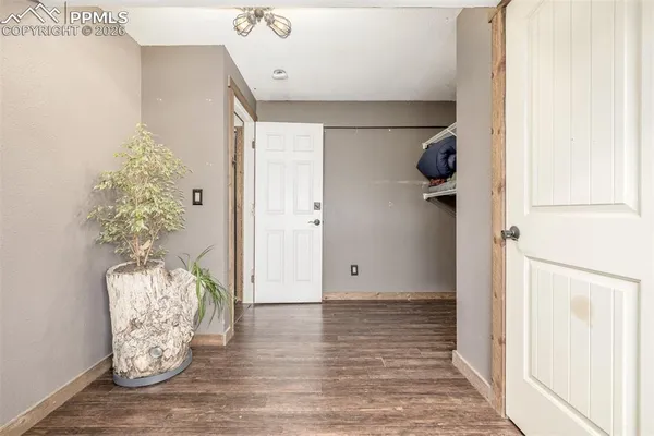 a view of entryway with wooden floor