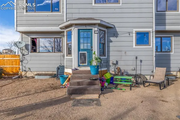 front view of house with outdoor seating