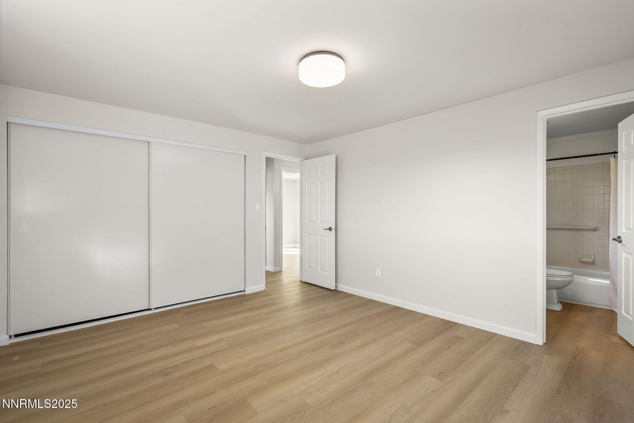 6780 Flower Street, Unit FENCED CORNER LOT Reno, NV 89506 - Photo 24 of 31 Primary door and bath