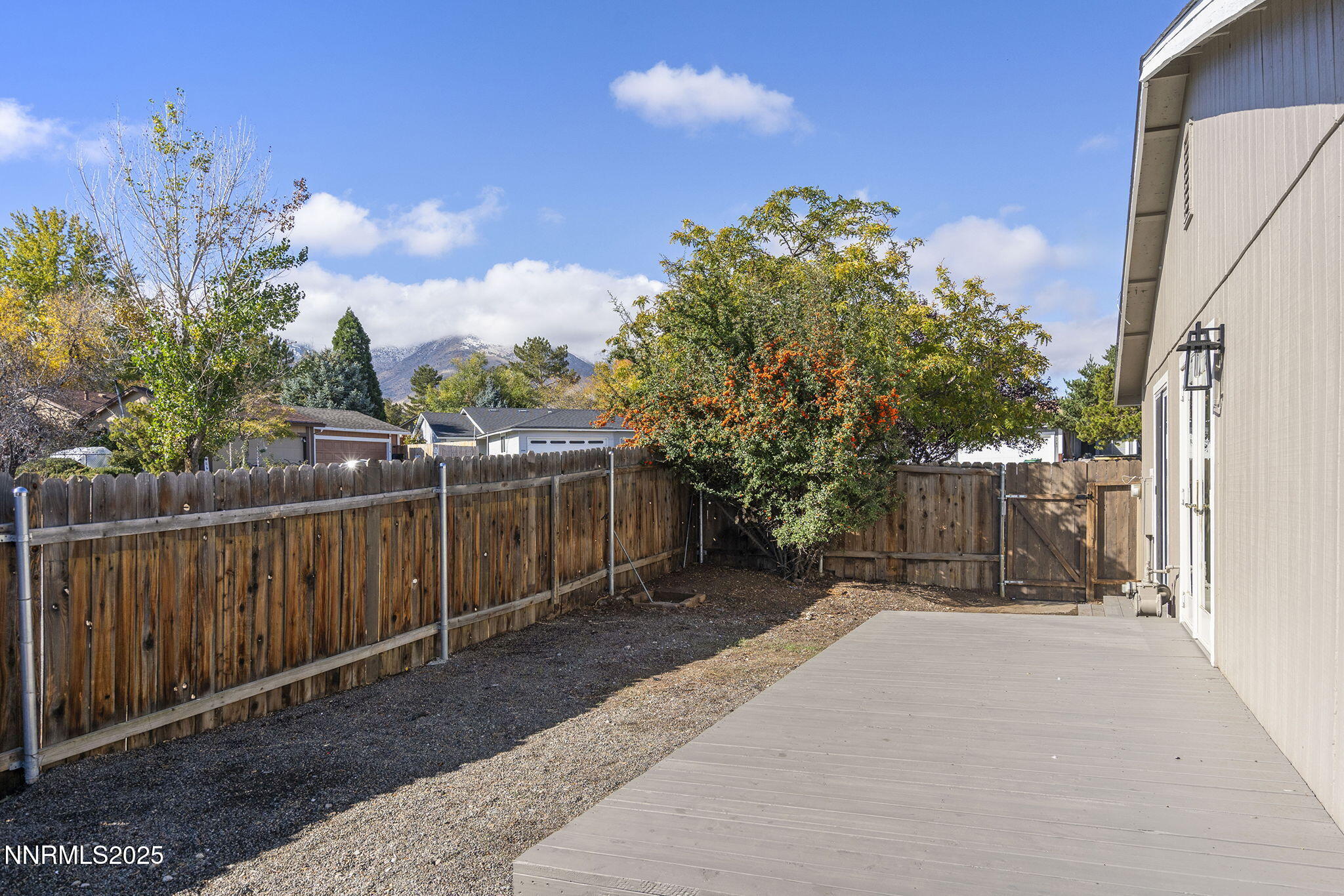 6780 Flower Street, Unit FENCED CORNER LOT Reno, NV 89506 - Photo 27 of 31 Deck to Front