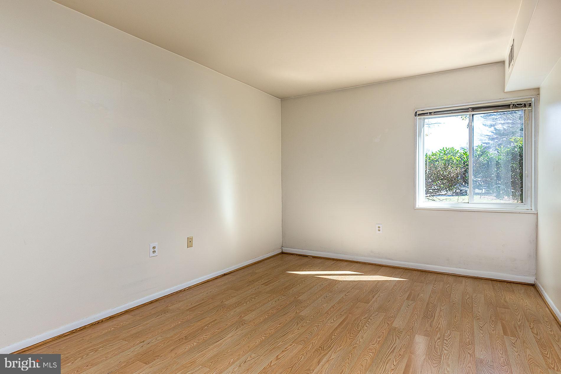 1530 Northgate Square, Unit 2A Reston, VA 20190 - Photo 10 of 22 HARDWOODS IN BEDROOM