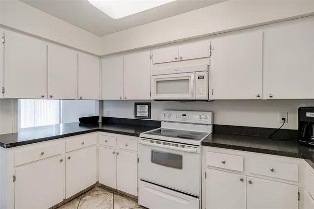 $235,000 | 147 Bluff View Drive, Unit 206, Belleair Bluffs, FL 33770