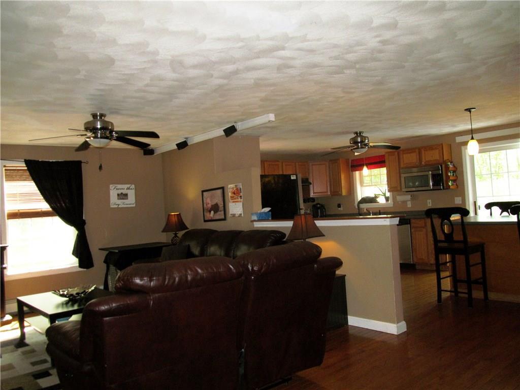 160 Old Mill Road Sanford, ME 04073 - Photo 9 of 24 Living area and Kitchen w/ hardwood...