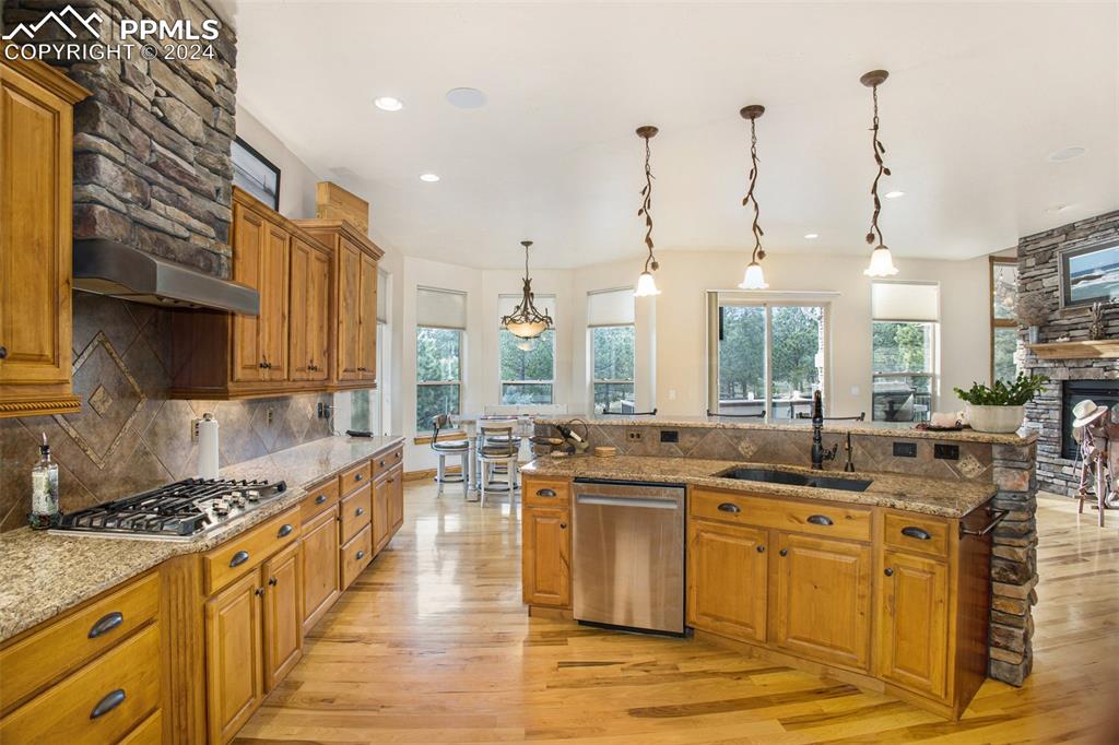 11628 Shaugnessy Road Colorado Springs, CO 80908 - Photo 14 of 50 a very nice looking kitchen with a large window