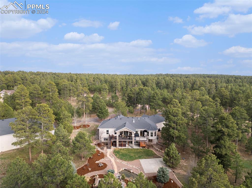 11628 Shaugnessy Road Colorado Springs, CO 80908 - Photo 44 of 50 an aerial view of residential houses with city view