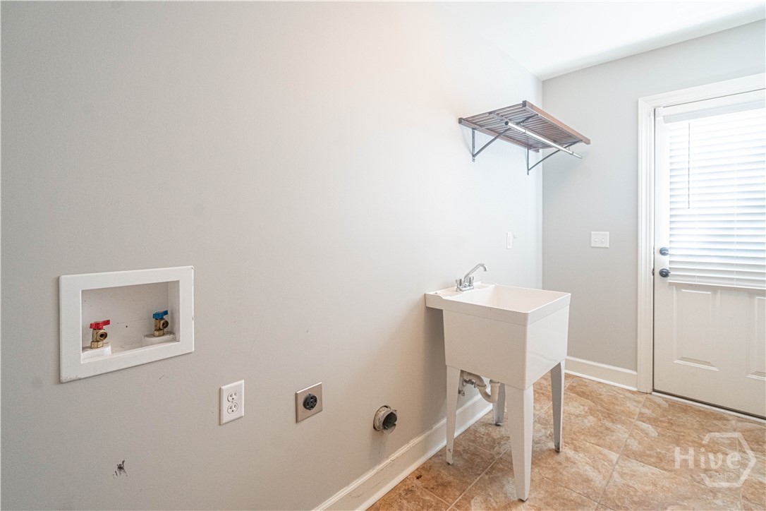 148 Sweetwater Circle Rincon, GA 31326 - Photo 56 of 62 Laundry Mudroom w sink and side entry