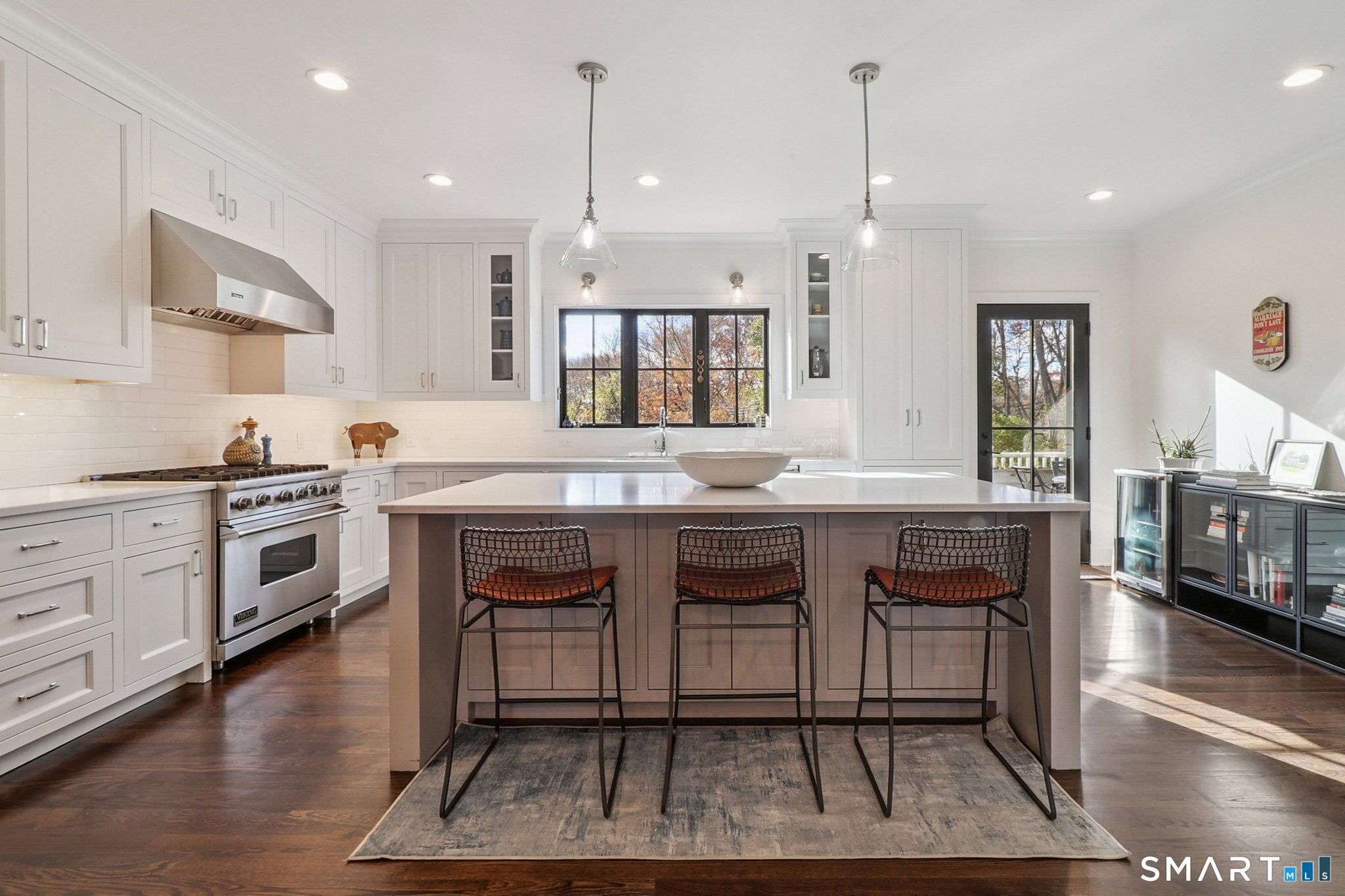 485 Westway Road, Unit 485 Fairfield, CT 06890 - Photo 11 of 39 a kitchen with granite countertop a stove a sink and a refrigerator