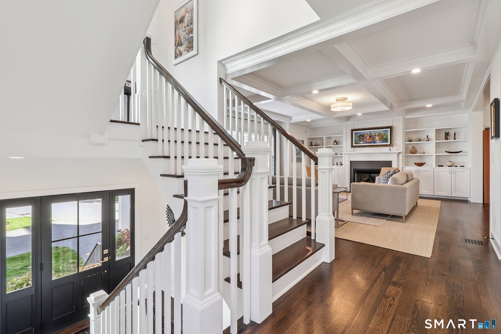 485 Westway Road, Unit 485 Fairfield, CT 06890 - Photo 14 of 39 a view of entryway and hall with wooden floor