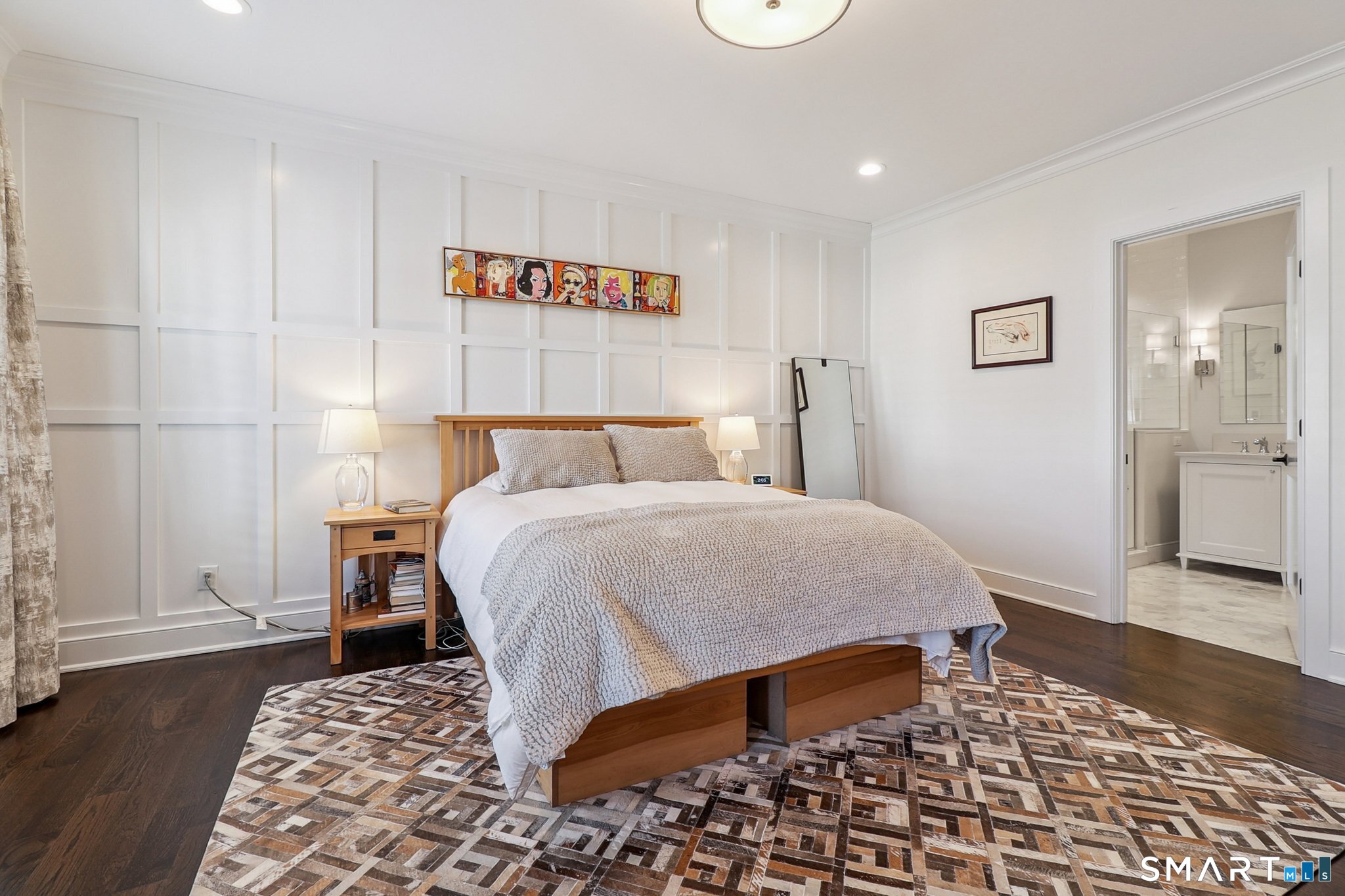 485 Westway Road, Unit 485 Fairfield, CT 06890 - Photo 19 of 39 a bedroom with a bed and wooden floor