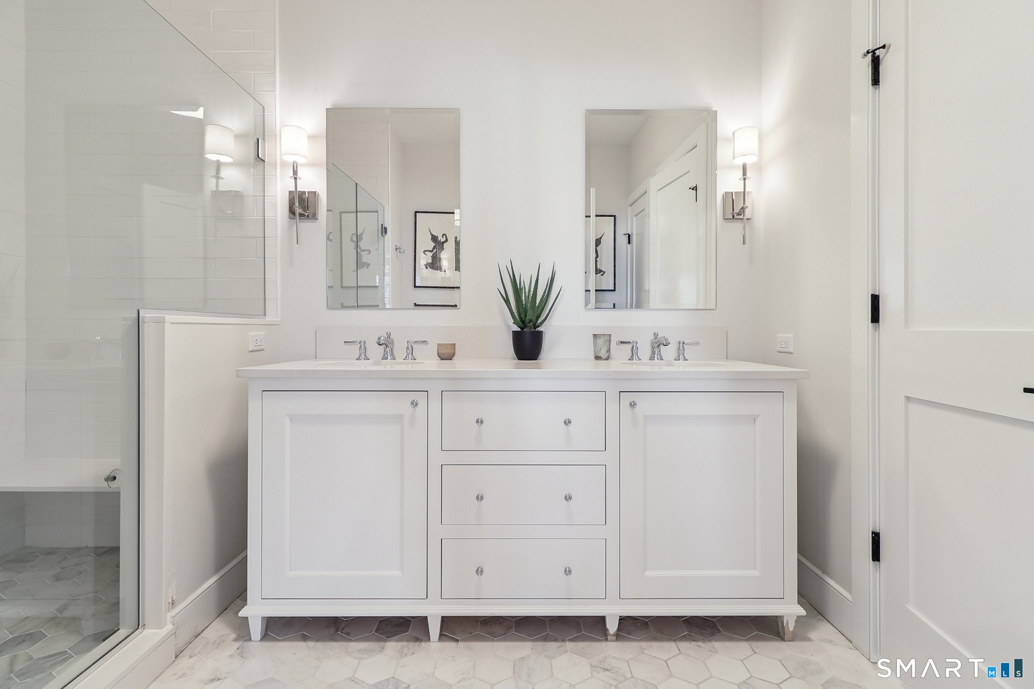 485 Westway Road, Unit 485 Fairfield, CT 06890 - Photo 20 of 39 a bathroom with a sink and a mirror