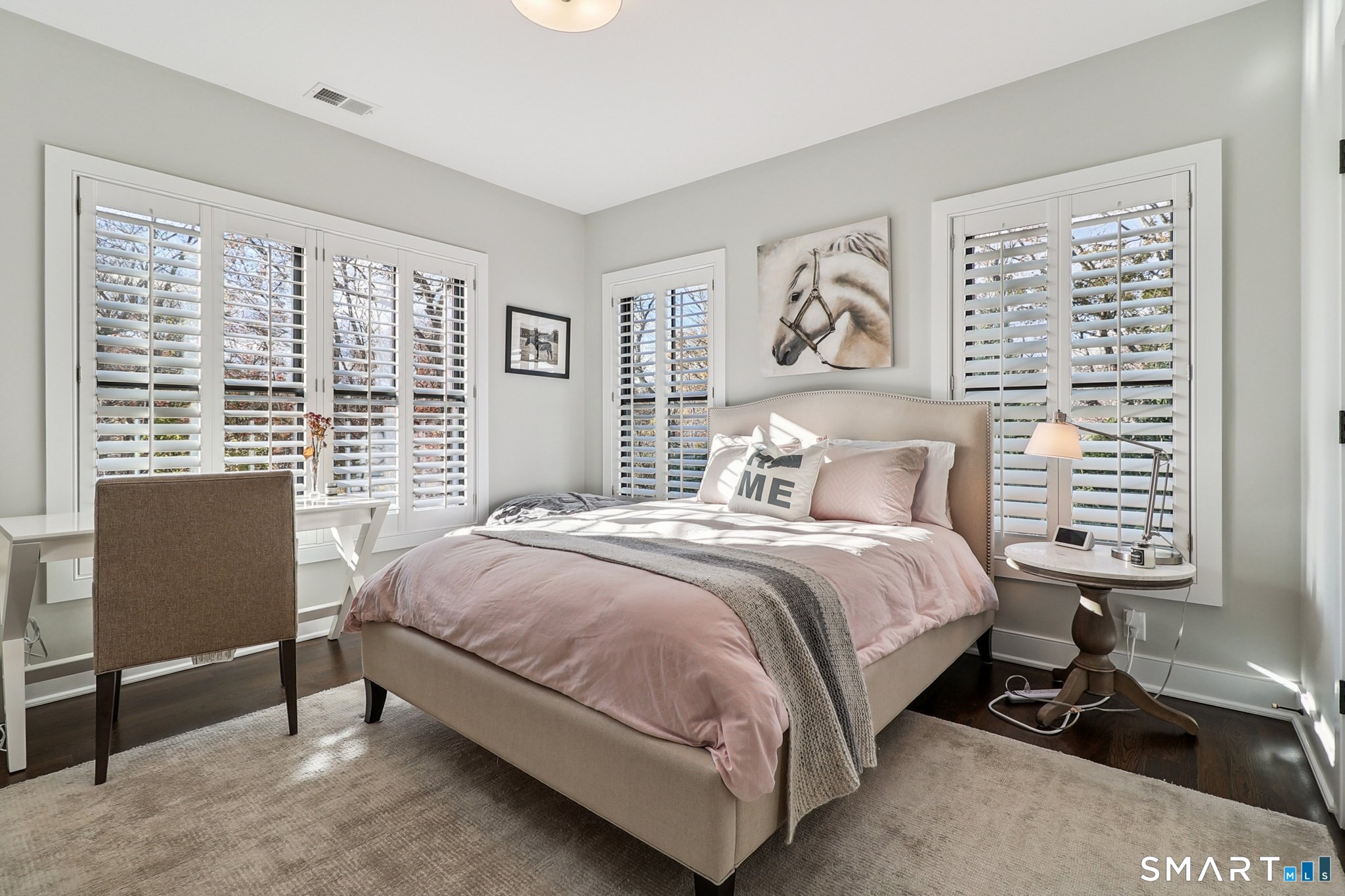 485 Westway Road, Unit 485 Fairfield, CT 06890 - Photo 23 of 39 a bedroom with a bed and a window