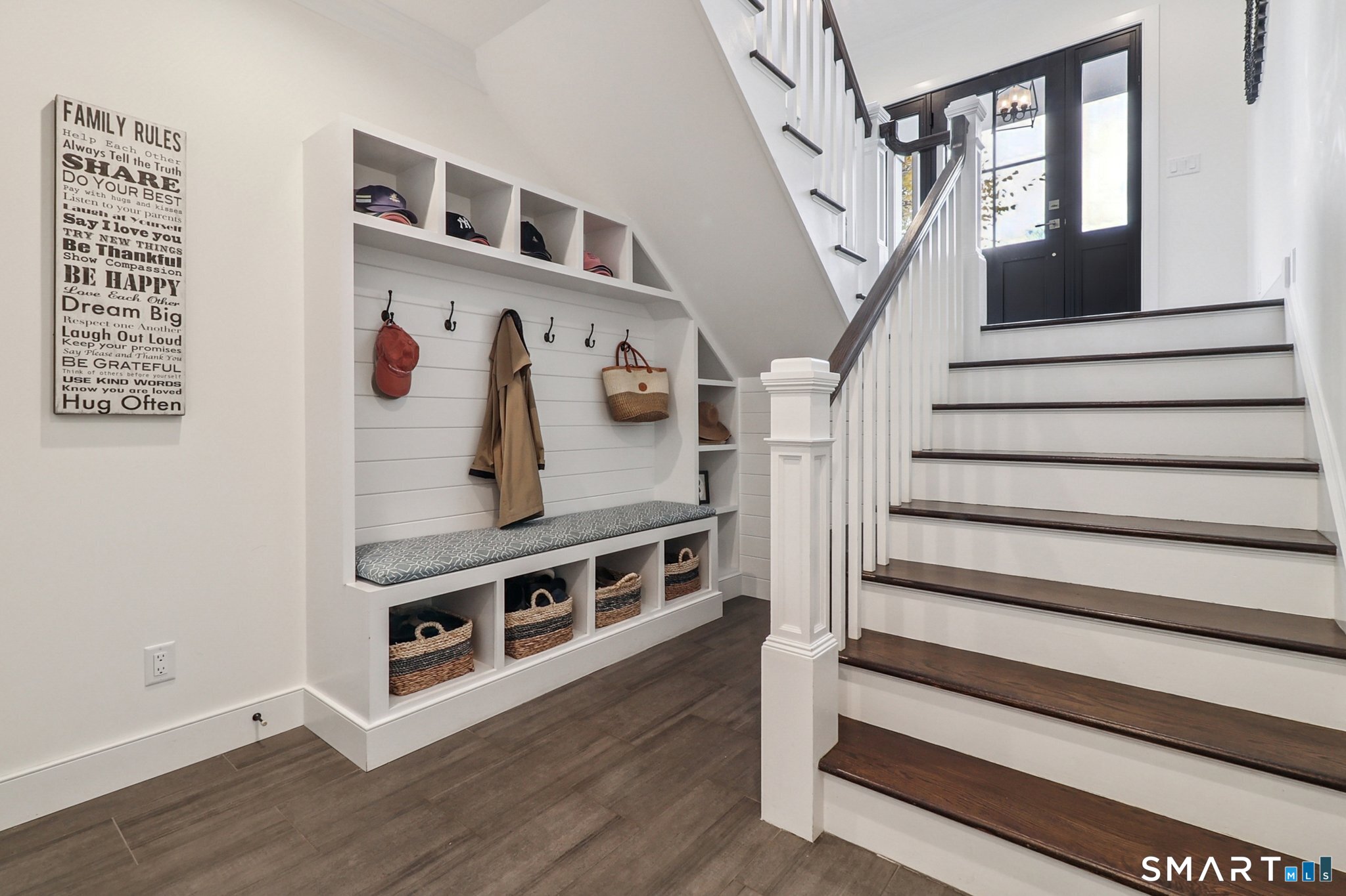 485 Westway Road, Unit 485 Fairfield, CT 06890 - Photo 27 of 39 a view of entryway and hall with wooden floor