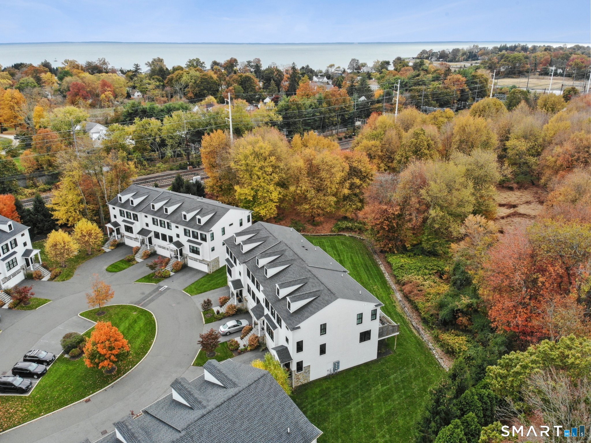 485 Westway Road, Unit 485 Fairfield, CT 06890 - Photo 3 of 39 an aerial view of a house with a yard