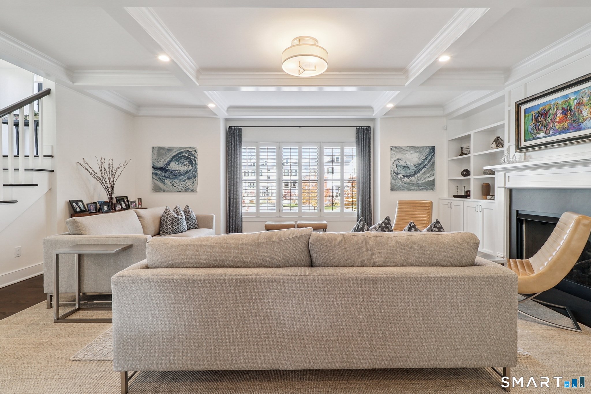 485 Westway Road, Unit 485 Fairfield, CT 06890 - Photo 5 of 39 a living room with furniture and a window