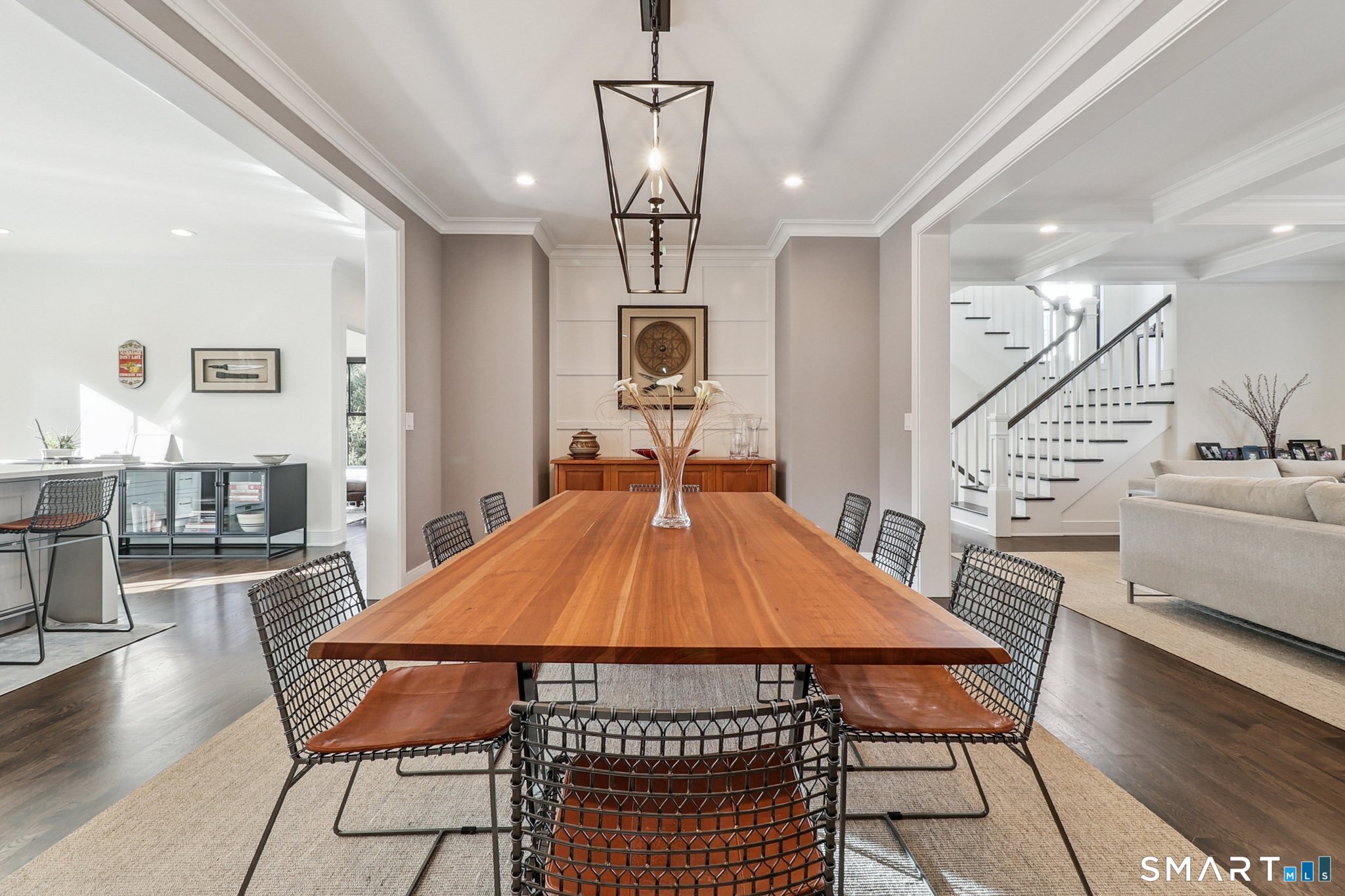 485 Westway Road, Unit 485 Fairfield, CT 06890 - Photo 6 of 39 a dining room with furniture and wooden floor