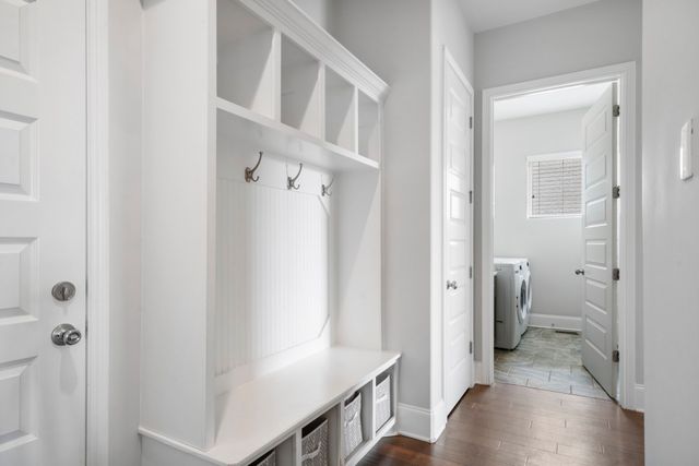 a view of a bathroom from a hallway