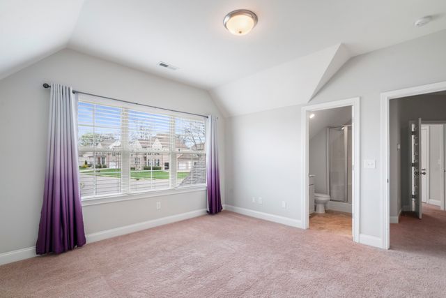 an empty room with yard and outdoor space