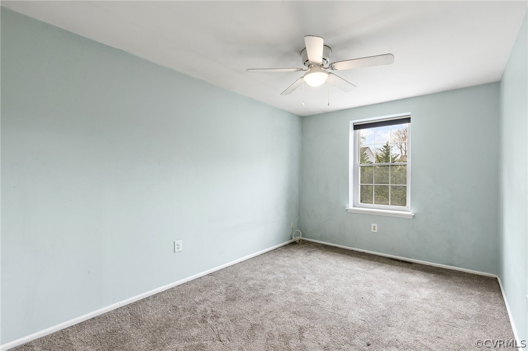 1413 Ransco Road North Chesterfield, VA 23235 - Photo 18 of 24 an empty room with a window and a fan