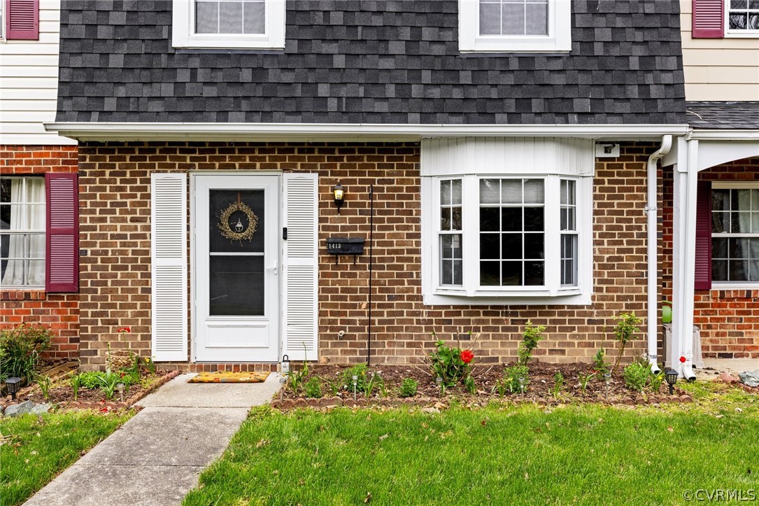 1413 Ransco Road North Chesterfield, VA 23235 - Photo 2 of 24 a front view of a house with a yard