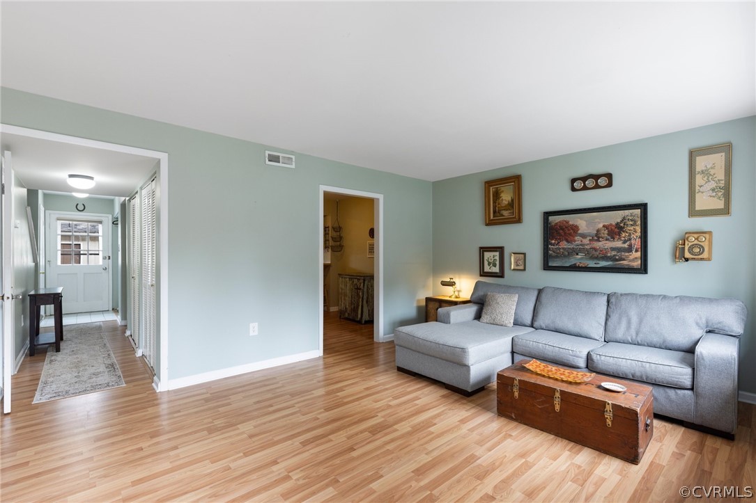 1413 Ransco Road North Chesterfield, VA 23235 - Photo 4 of 24 a living room with furniture and a wooden floor