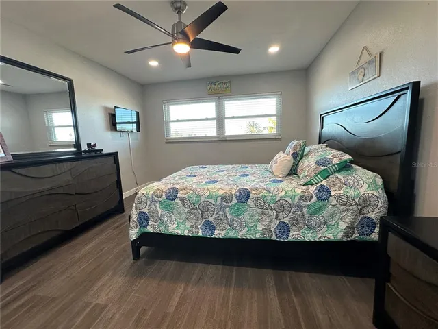 a bathroom with a toilet a sink and shower