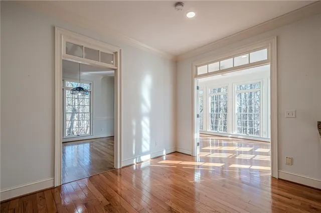 a view of empty room with windows