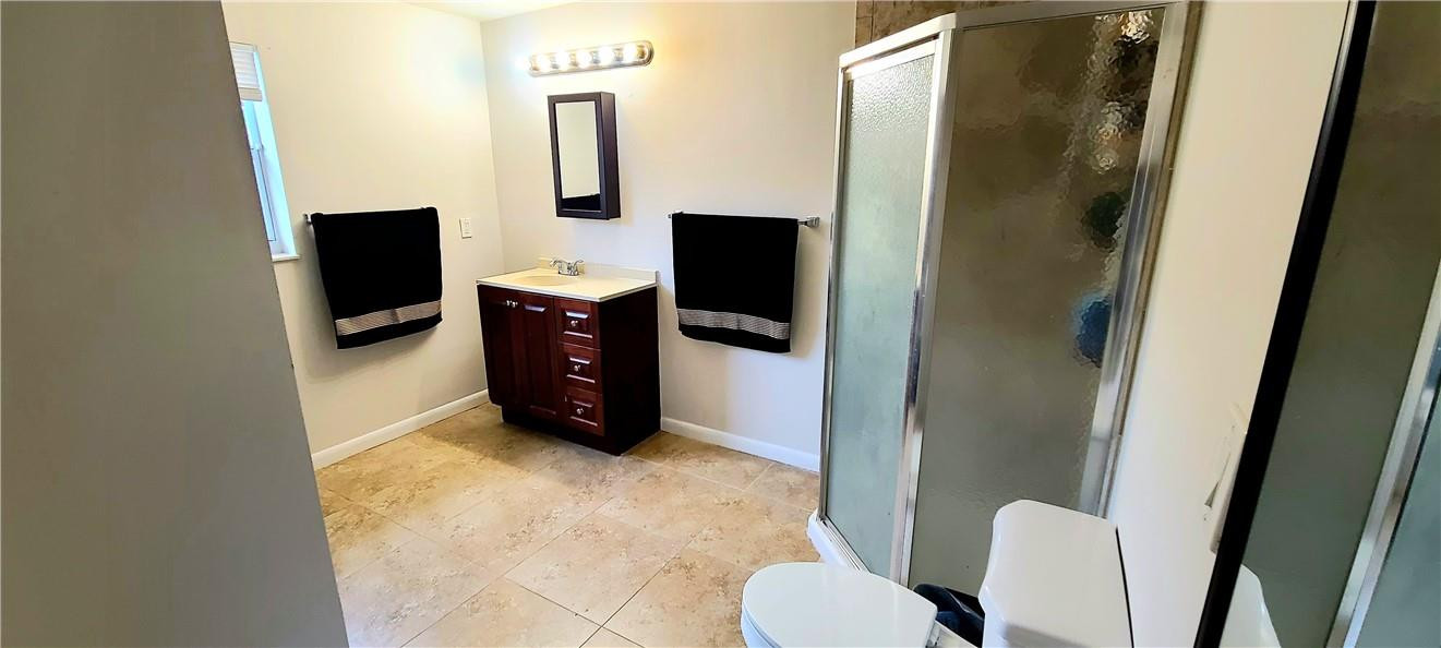 361 Northwest 37th Street Pompano Beach, FL 33064 - Photo 11 of 21 a bathroom with a toilet