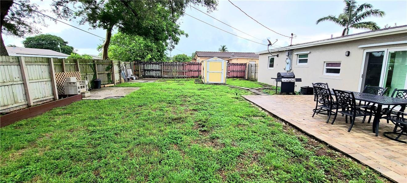 361 Northwest 37th Street Pompano Beach, FL 33064 - Photo 21 of 21 a view of a backyard with sitting area